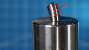 Close-up damage example showing a bent 3/8-24 CHA CFM-34 HD base stud